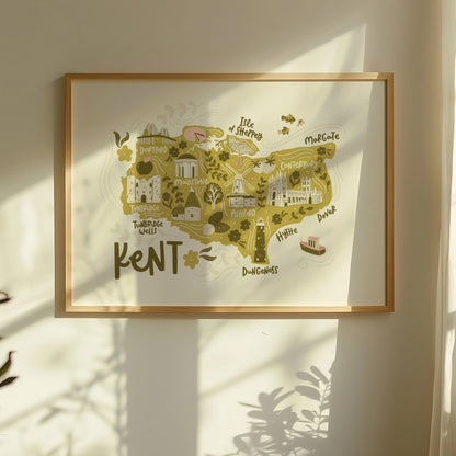 Lifestyle photo of an illustrated map of Kent, showing a framed print with a window shadow.