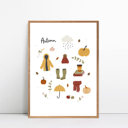 Autumn decor print featuring pumpkins, a yellow raincoat, books and an umbrella. Illustrated by Abbie Imagine