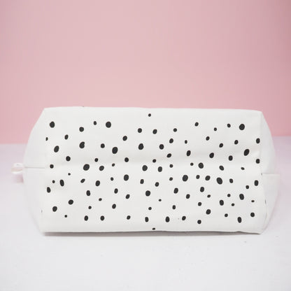 Polka dot pattern bottom of Cheetah spotty cosmetic bag by Abbie Imagine