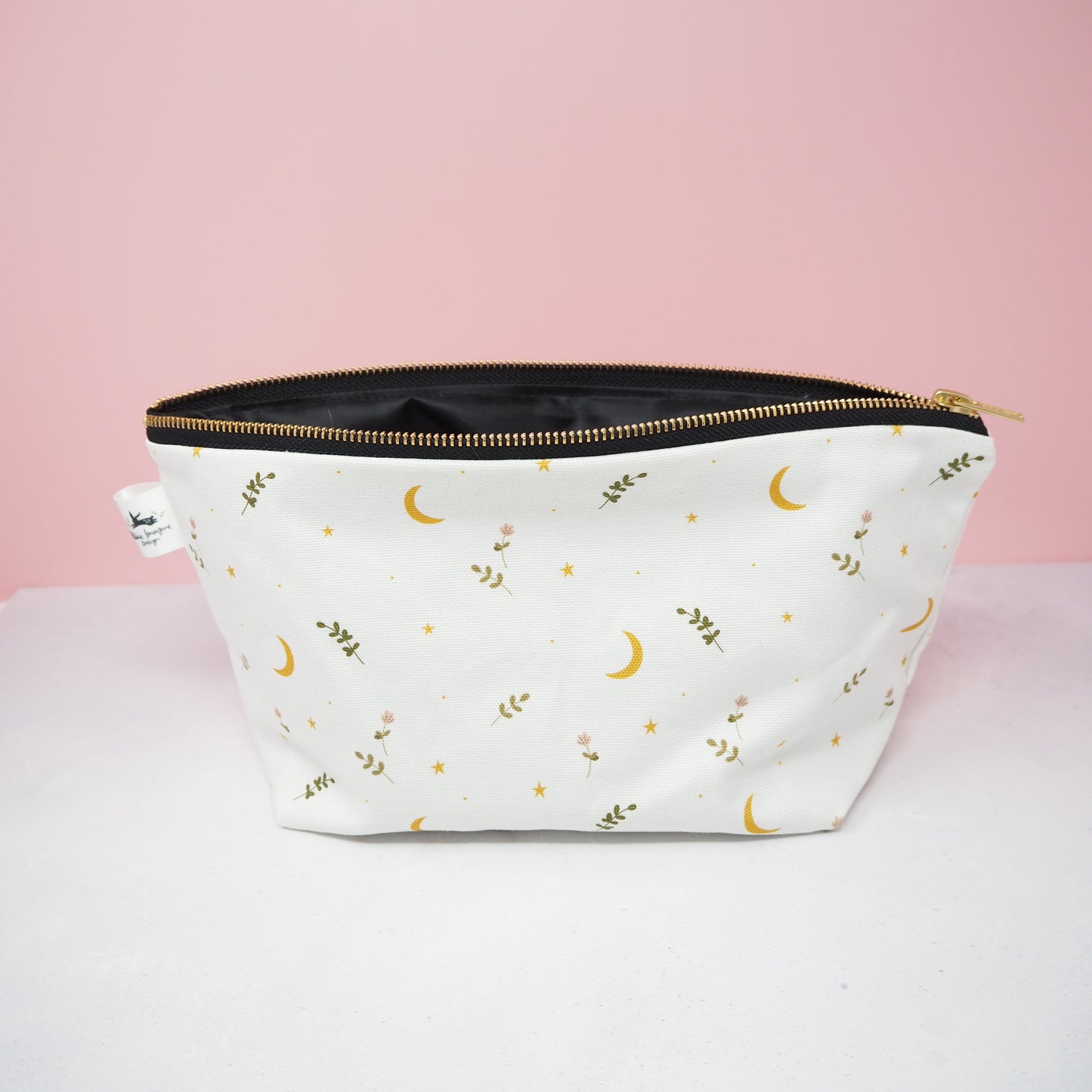 Open moons and stars cosmetic bag by Abbie Imagine
