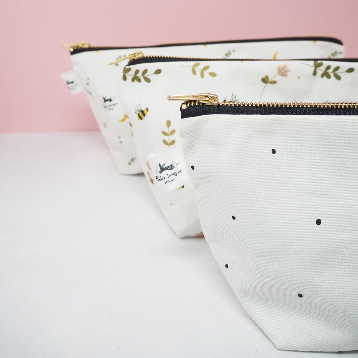 Polka dot, bees and moons wash bags by Abbie Imagine